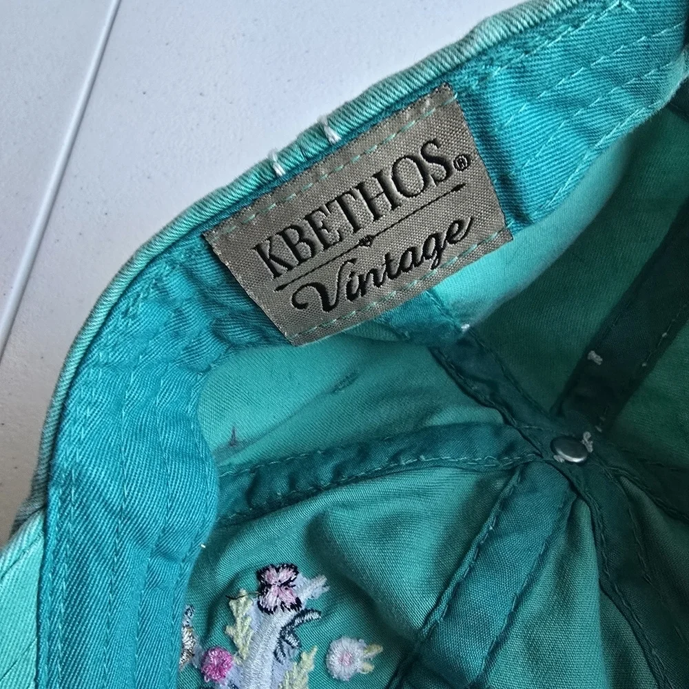 Kbethos Vintage Embroidered Teal Cap with Floral Design.